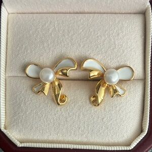 Elegant Gold and White Bow Earrings